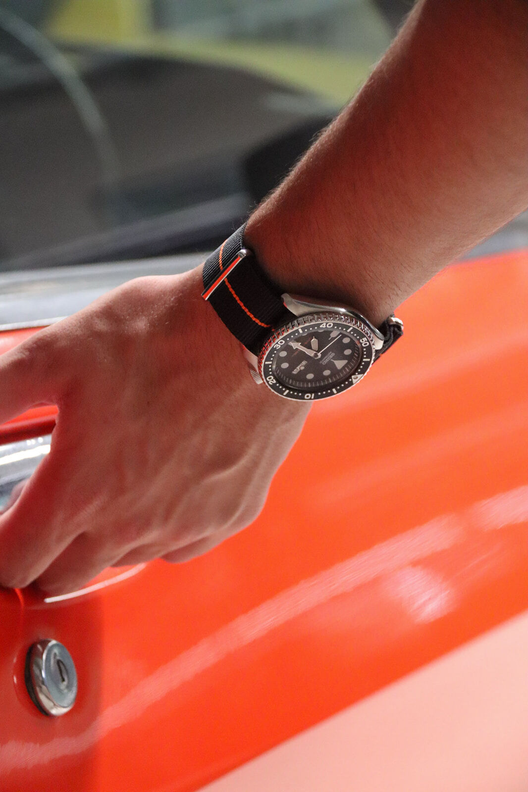 Charcoal Black & Orange NATO strap
